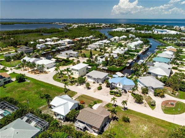 Captain's Cove, 7841 Breakwater Ct, Bokeelia, Florida 33922, image 2