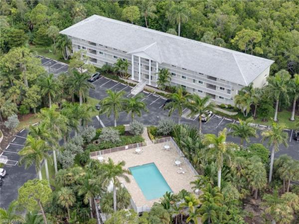 Naples Sandpiper Bay Club, 3021 Sandpiper Bay Cir #E106, Naples, Florida 34112, image 2
