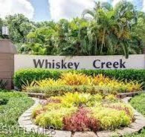 Whiskey Creek Village Green, 1519 Whiskey Creek Dr, Fort Myers, Florida 33919, image 1