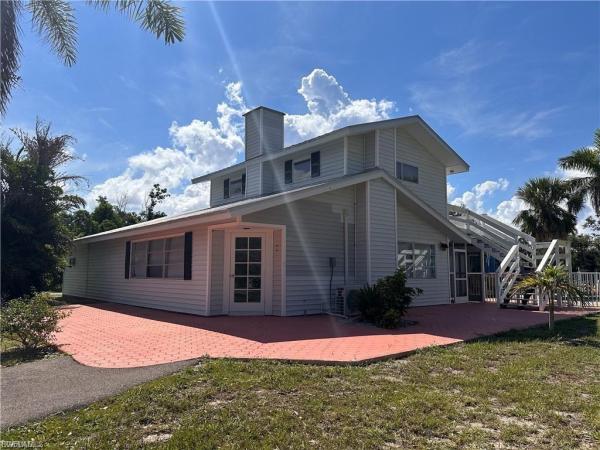 Isle Of Pines, 7692 Myrsine Cir, Bokeelia, Florida 33922, image 1