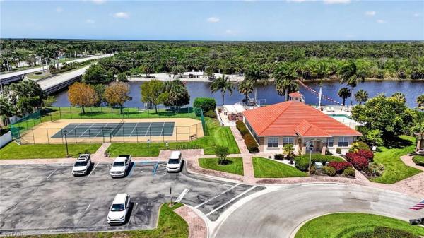 Orchid Cove At Port Of The Islands, 25009 Peacock Ln #1-201, Naples, Florida 34114, image 2