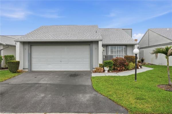 Woodcrest Village, 18441 Orangecrest Ct, Lehigh Acres, Florida 33936, image 1