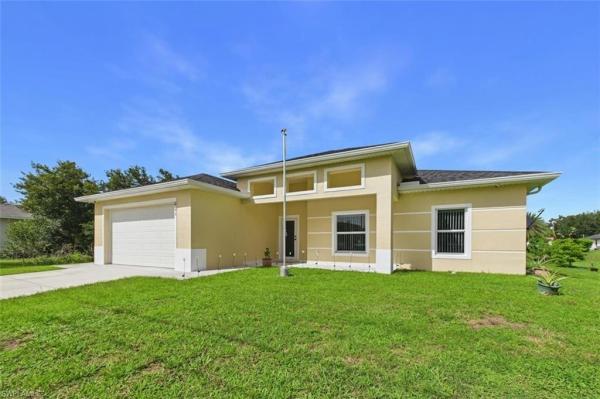 621 Tomasello Dr, Lehigh Acres, Florida 33974, image 2