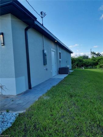 712 E Theodore Vail St, Lehigh Acres, Florida 33974, image 1