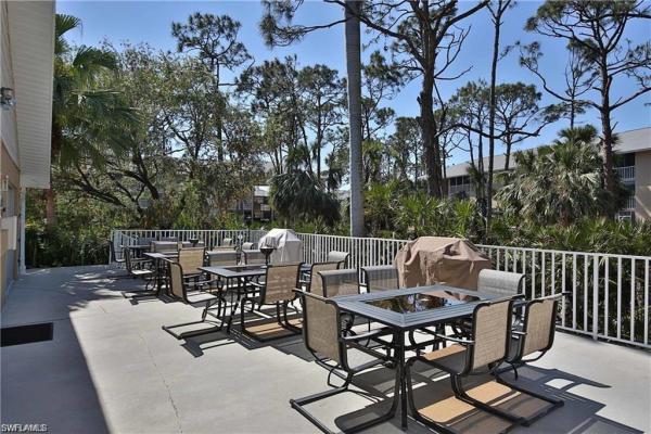 Naples Sandpiper Bay Club, 3031 Sandpiper Bay Cir #F106, Naples, Florida 34112, image 1
