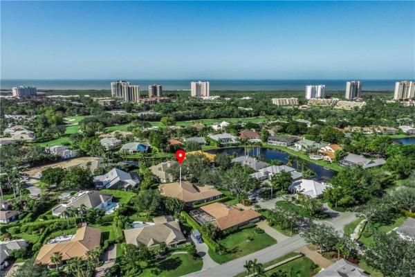 Pelican Bay Woods, 704 Tamarind Ct, Naples, Florida 34108, image 1