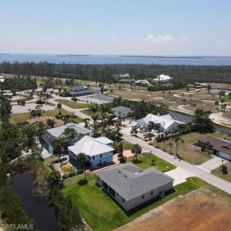 Alden Pines, 14372 Clubhouse Dr, Bokeelia, Florida 33922, image 1