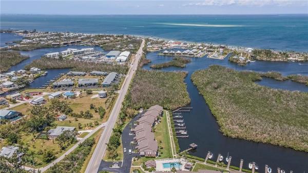 Captain's Harbor, 16348 Nautical Way #103, Bokeelia, Florida 33922, image 1