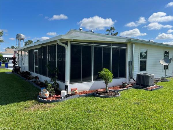 Pinewood, 41 Desert Candle Cir, Lehigh Acres, Florida 33936, image 1