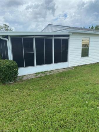 Pinewood, 35 Desert Candle Cir, Lehigh Acres, Florida 33936, image 1