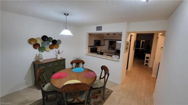 Pipers Pointe At Palm River Estates, 121 Wading Bird Cir #B-102, Naples, Florida 34110, image 1