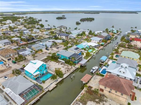 Santini Cross, 210 Curlew St, Fort Myers Beach, Florida 33931, image 1