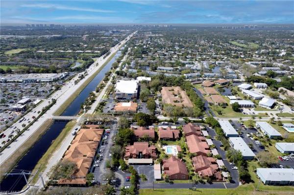Sharondale At Palm River Estates, 122 E Cypress Way #C4, Naples, Florida 34110, image 1