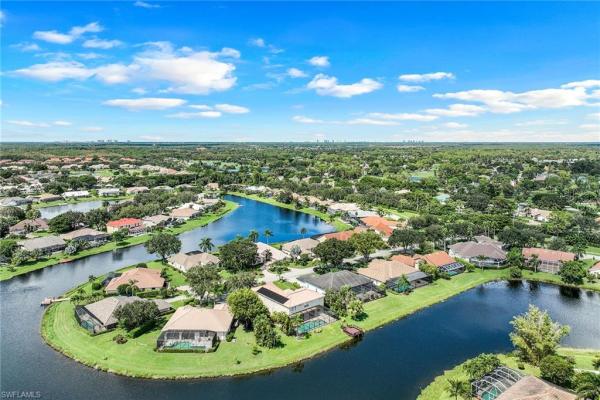 Longshore Lake, 11749 Pintail Ct, Naples, Florida 34119, image 1