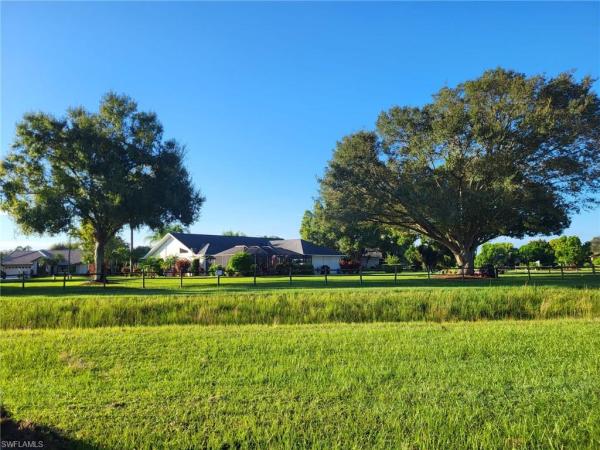 Lehigh Acres Residential, 542 Whispering Wind Bnd, Lehigh Acres, Florida 33974, image 1