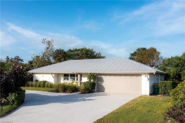 Palm River Estates, 409 E Cypress Way, Naples, Florida 34110, image 1