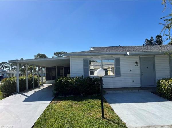 Pinewood, 46 Desert Candle Cir, Lehigh Acres, Florida 33936, image 1
