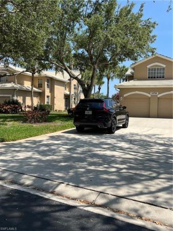Lakemont Cove At Pelican Landing, 24748 Lakemont Cove Ln #101, Bonita Springs, Florida 34134, image 2