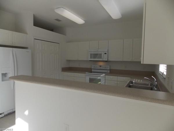 7376 Bristol Cir, Naples, Florida 34120, image 1