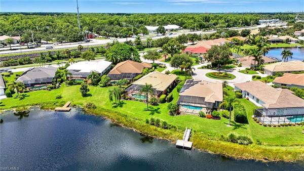 Longshore Lake, 10826 Fulmar Ct, Naples, Florida 34119, image 1