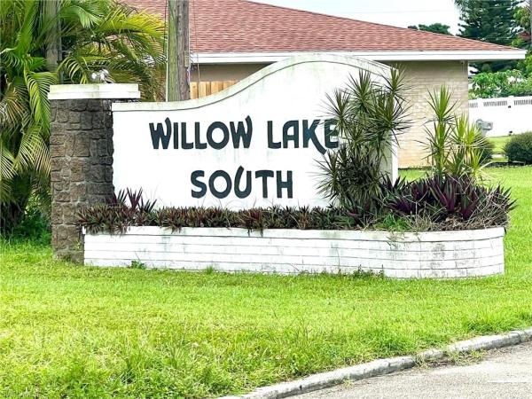 Willow Lake, 834 Gardenside Ct, Lehigh Acres, Florida 33936, image 1
