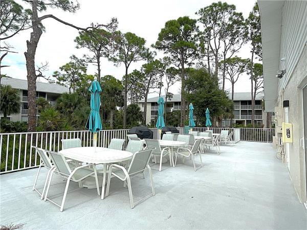 Naples Sandpiper Bay Club, 3002 Sandpiper Bay Cir #A103, Naples, Florida 34112, image 2
