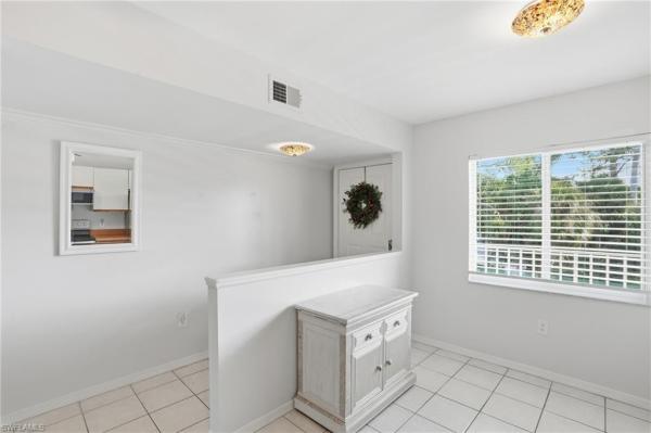 Naples Sandpiper Bay Club, 3021 Sandpiper Bay Cir #E202, Naples, Florida 34112, image 1