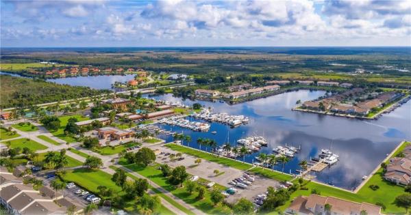 Orchid Cove At Port Of The Islands, 25085 Peacock Ln #102, Naples, Florida 34114, image 2