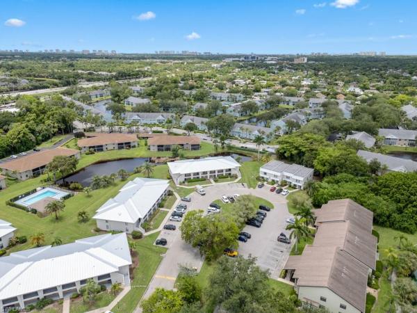 Haciendas At Palm River Estates, 151 E Cypress Way #E101, Naples, Florida 34110, image 1