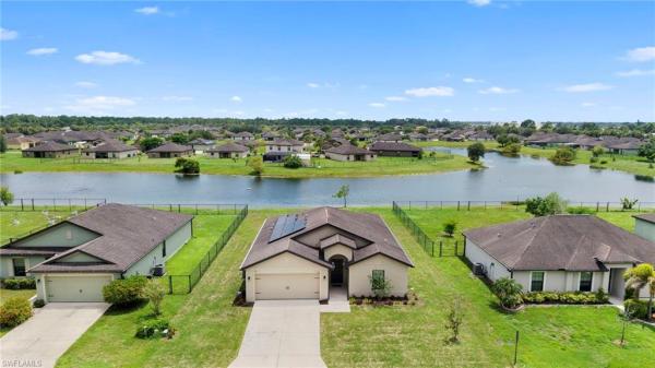 Shadow Lakes, 724 Evening Shade Ln, Lehigh Acres, Florida 33974, image 2