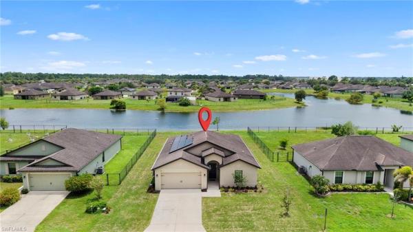 Shadow Lakes, 724 Evening Shade Ln, Lehigh Acres, Florida 33974, image 1