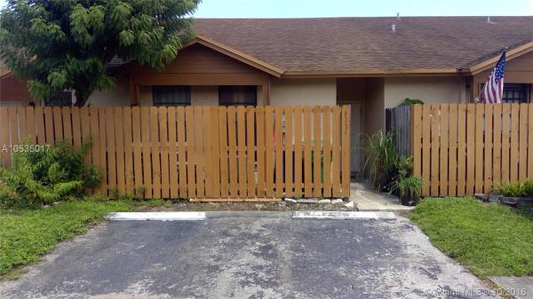 Aspen Townhomes, 6771 NW 187th Ter #6771, Country Club, Florida 33015, image 2