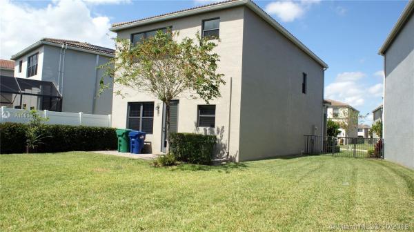 Champion Lakes, 736 NE 191st Ter, Ives Estates, Florida 33179, image 2