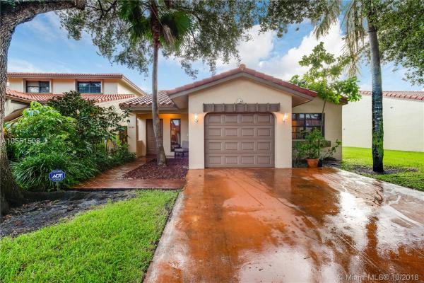 The Moors Townhouses, 6638 NW 174th LN, Country Club, Florida 33015, image 2