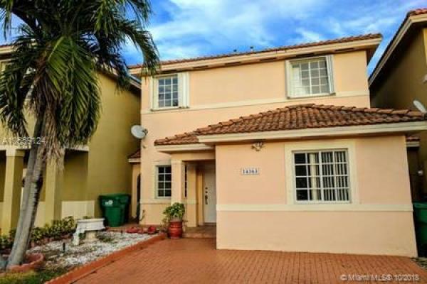 Precious Homes At Twin Lakes, 14363 SW 136th Ct, Three Lakes, Florida 33186, image 2