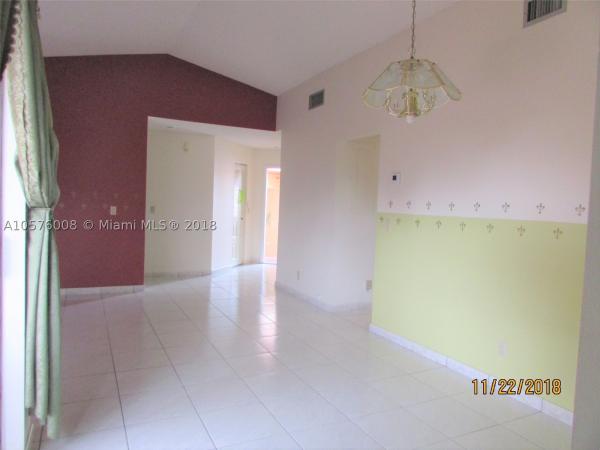 Villa Homes At The Moors, 6458 NW 170th Ter #6458, Country Club, Florida 33015, image 2