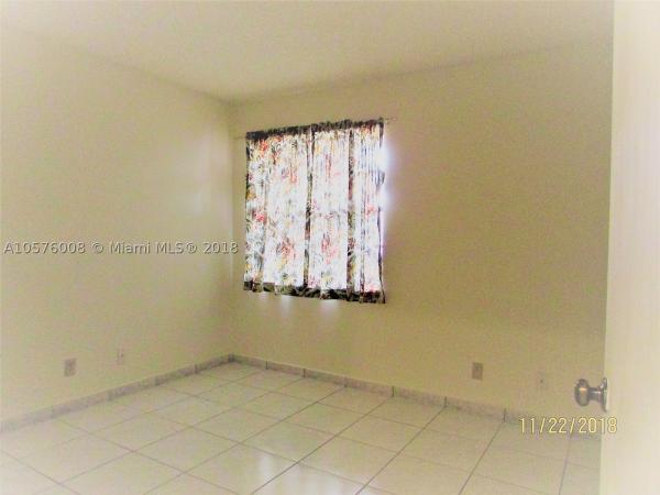 Villa Homes At The Moors, 6458 NW 170th Ter #6458, Country Club, Florida 33015, image 3