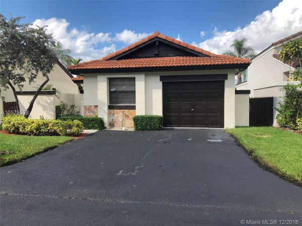The Moors Cluster Homes, 17334 NW 63rd Pl, Country Club, Florida 33015, image 2