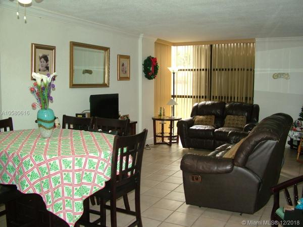 The Courtyard Villas, 18000 NW 68th Ave #105A, Country Club, Florida 33015, image 2