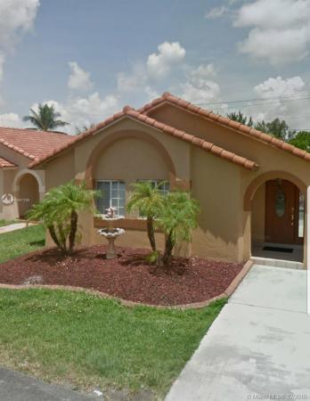 Turtle Run Estates, 7635 NW 168th Ter, Country Club, Florida 33015, image 2