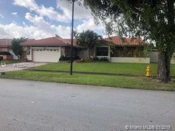 Country Lake Manors, 20062 NW 66th Pl, Country Club, Florida 33015, image 2