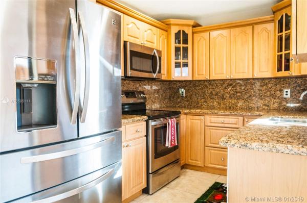 Villa Homes At The Moors, 6228 NW 170th Ter 0, Country Club, Florida 33015, image 2