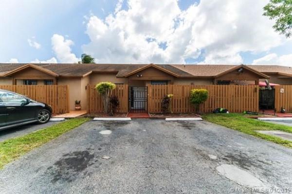 Aspen Townhomes, 6744 NW 188th Ter #NA, Country Club, Florida 33015, image 2