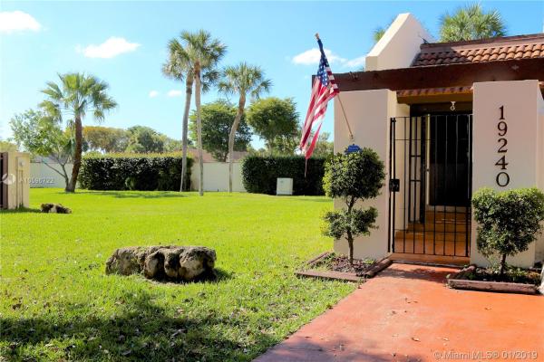Townhomes Of Country Lake, 19240 NW 65th Ct, Country Club, Florida 33015, image 2