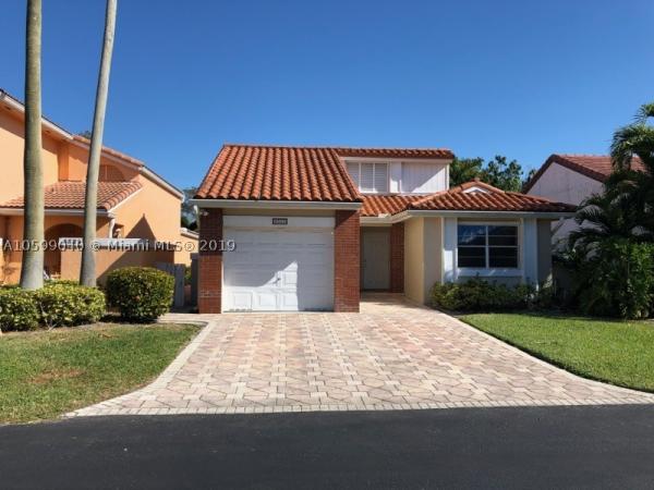 The Moors Cluster Homes, 6325 NW 175th Ter, Country Club, Florida 33015, image 2