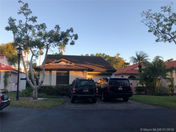 The Moors Cluster Homes, 17413 NW 63rd Ave, Country Club, Florida 33015, image 2