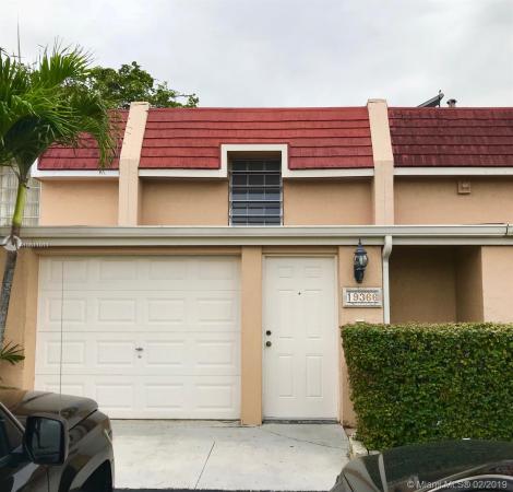 Fairway Townhouses, Country Club, Florida 33015, image 2
