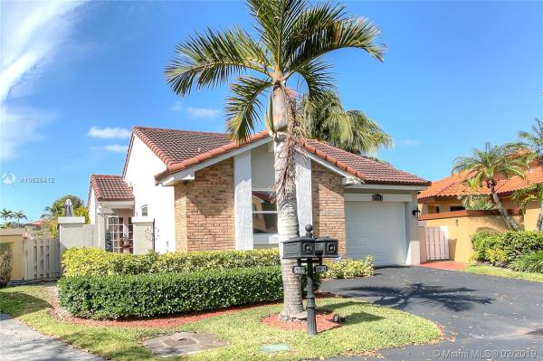 The Moors Cluster Homes, 17302 NW 63rd Pl, Country Club, Florida 33015, image 2