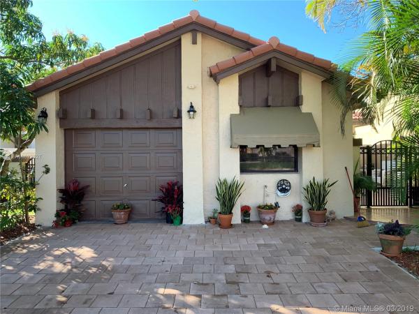 The Moors Cluster Homes, 17424 NW 63rd Ct, Country Club, Florida 33015, image 2