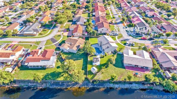 Country Lake Manors, 20167 NW 58th Pl, Country Club, Florida 33015, image 2